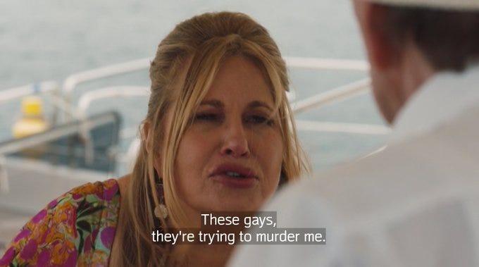 still from White Lotus of Jennifer Coolidge saying "These gays, they're trying to murder me"