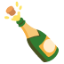 Champagne bottle emoji; it's at an angle and the cork is popped with droplets popping out